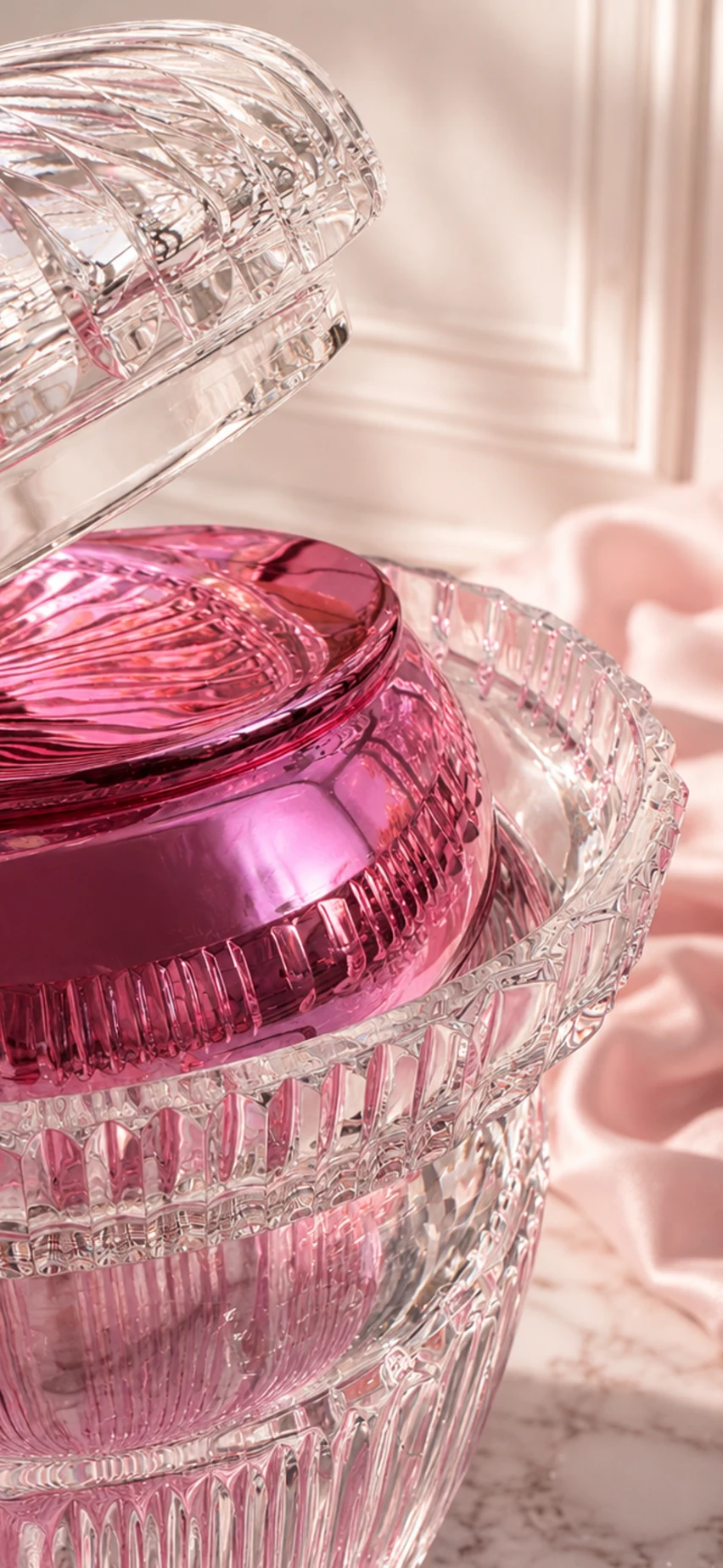 A Sariel piece up close, the lid lifted clear of the rose porcelain core